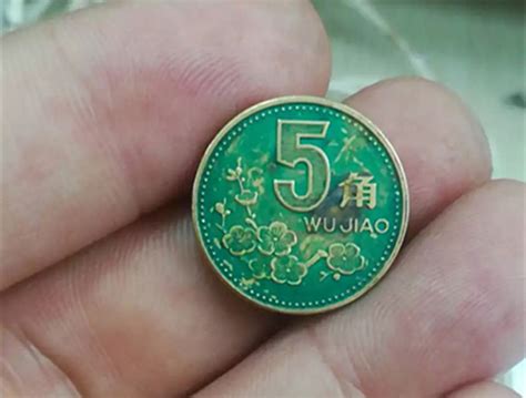 手雕版梅花5角硬币，若是一个年份，一枚增值了100倍