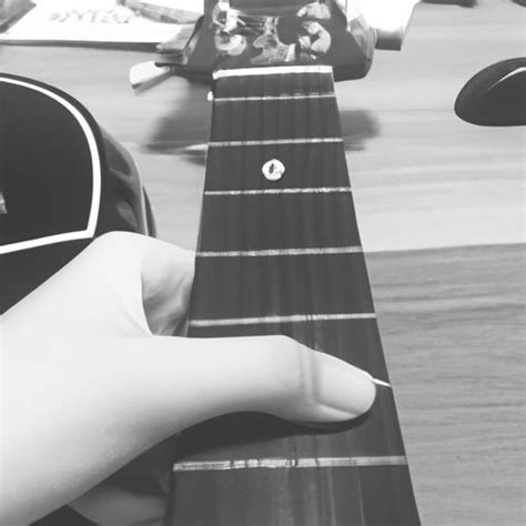 如何减轻新手弹吉他按弦时手指疼痛-百度经验