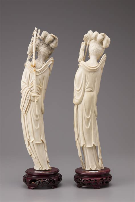 A pair of ivory standing figures of Meiren | OAA