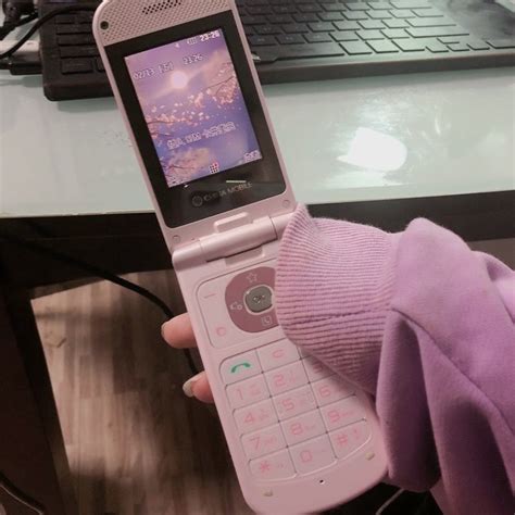 粉色翻盖手机非主流头像