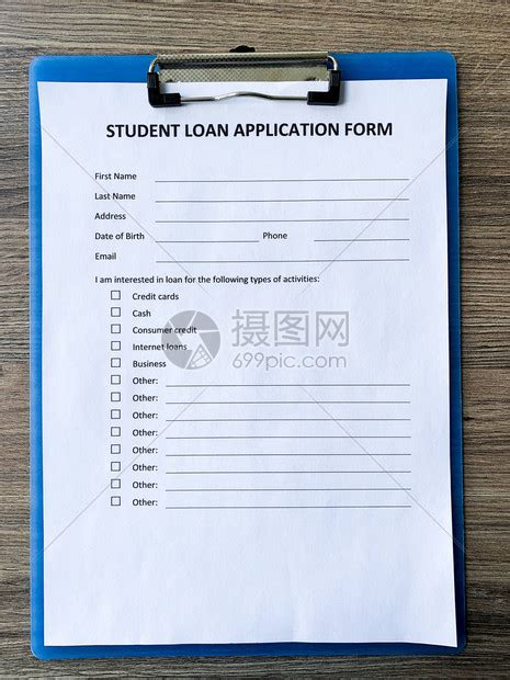 桌上的学生申请贷款表格文件高清图片下载-正版图片504556170-摄图网