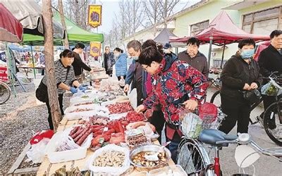 购买商品，品尝美食，感受乡土气和烟火气——乡镇大集“火”出圈 - 新华网客户端