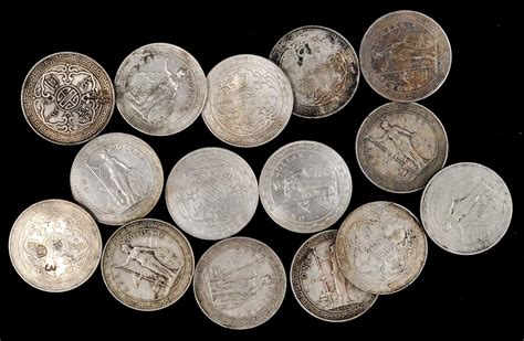 1899-1912年英国贸易银元站洋一圆银币。孟买铸币厂。15枚。GREAT BRITAIN. Group of Trade Dollars ...