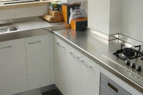 现代厨房不锈钢台面整体橱柜效果图_土巴兔装修效果图