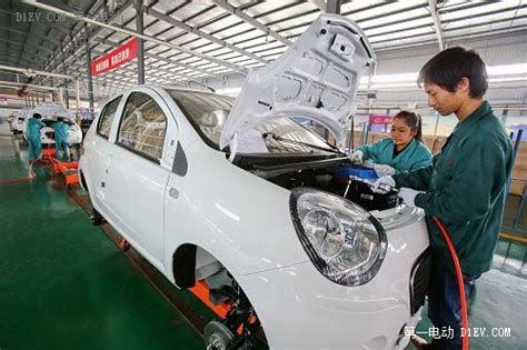 浙江金华： 新能源汽车生产火热-人民图片网