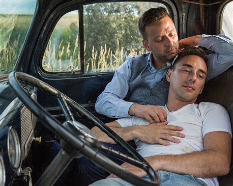 Gay Men Cuddling Romantically In Vehicle By Shaun Robinson | Free Hot ...