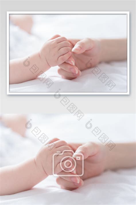 儿童母婴婴儿牵着妈妈的手特写摄影图片图片-包图网
