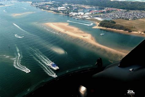 直升机俯瞰澳大利亚感受最美的海中岛礁_私人飞机网