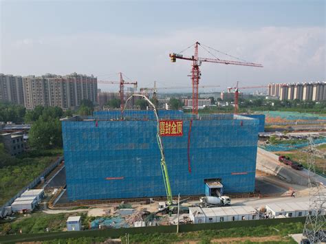 中国水电三局 基层动态 镇平县怡居健康养生城项目首栋公寓封顶