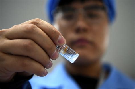 “病毒变异疫苗还有用吗”，记者探访北京一新冠疫苗生产车间 | 北晚新视觉
