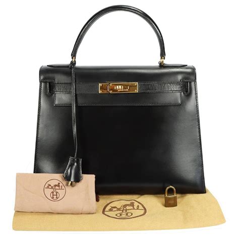 Hermès Kelly 28 Black Boxcalf Gold Leather Pony-style calfskin ref ...