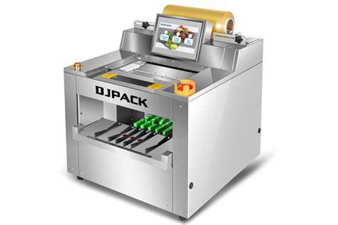 DBZ-15D自动保鲜膜包装机自动称重，裹膜、打印 -DBZ-15D自动保鲜膜包装机-苏州德赛斯厨房设备有限公司