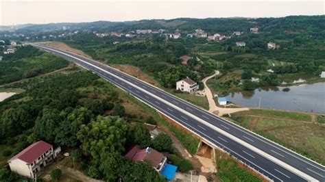 岳阳北环线洛家山路正式通车|岳阳市公路桥梁基建总公司|