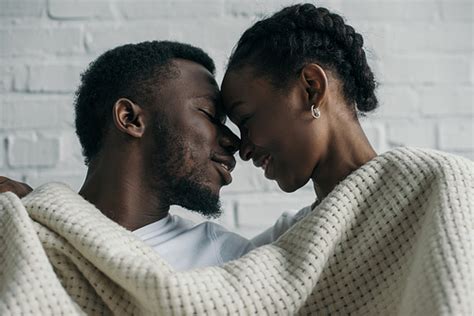 유토이미지 | beautiful happy young african american couple able to kiss at home