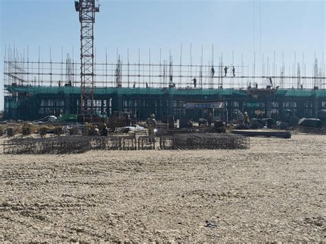 【园区动态】抢工期 保进度 丹东港边民互市贸易区项目建设不停歇_施工人员_建筑
