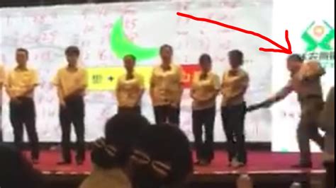 This Brutal Video Of A Chinese Coach Publically Spanking Bank Employees ...