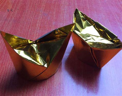 金鱼元宝的叠法折纸(折叠小金鱼的折纸方法) - 抖兔学习网