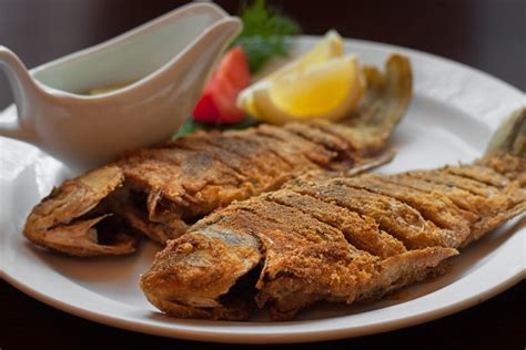 鱼怎么炸最好吃 ，挂糊用淀粉还是面粉？记住"5大技巧"，鱼肉金黄酥脆 | 说明书网