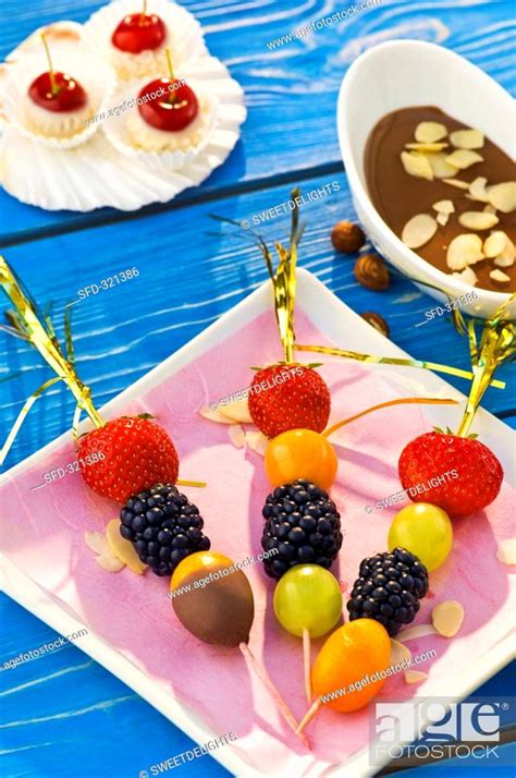 Skewered berries with chocolate sauce, Stock Photo, Picture And Rights ...