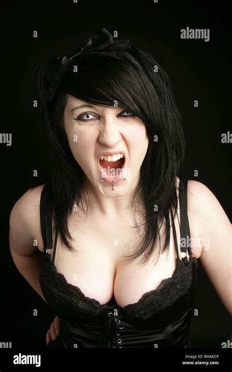 Dark haired 18 year old goth girl shouting Stock Photo - Alamy