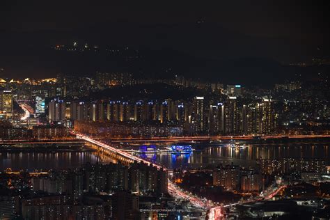韩国全景首尔市中心城市景观的空中日落夜景与首尔塔高清图片下载-正版图片300856691-摄图网