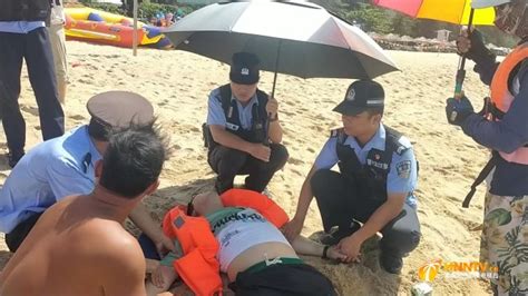三亚：游客中暑晕倒沙滩 海岸警察紧急救助_国内_海南网络广播电视台