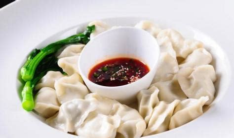 上海饺子用筷子蘸醋高清图片下载-正版图片504977540-摄图网