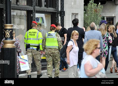 Regent Street, London, UK. 21st July 2012. Military Police personnel ...