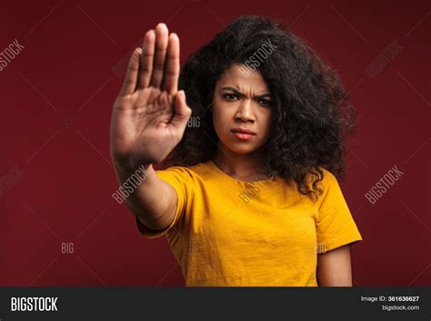 Free Photo | Picture of angry dissatisfied asian woman clenches fist ...
