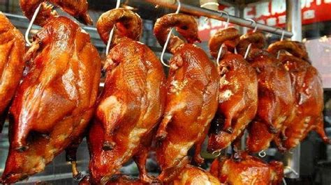 烧鸭和烤鸭有什么区别，为什么烤鸭不能直接啃着吃？ - 知乎