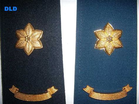 二战时期英国皇家海军军官帽徽及军衔标志（肩章，袖章，臂章）_新闻动态_官兰贸易