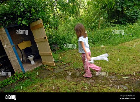 Toilet, Outside toilet, girl using an outdoor toilet Stock Photo - Alamy