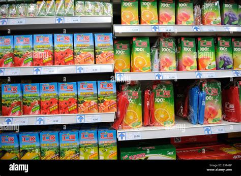 Cartons of Huiyuan processed orange juice for sale at a supermarket in ...