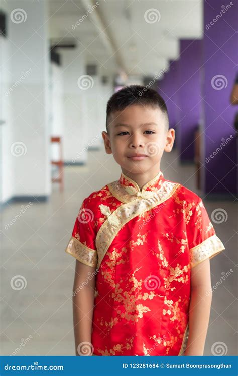 Chinese boy in traditional costume Royalty Free Vector Image