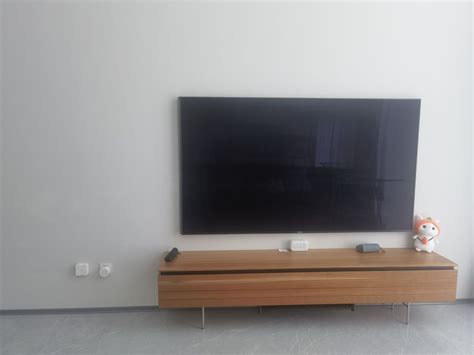 75寸电视挂墙离地面多少合适 - 家核优居