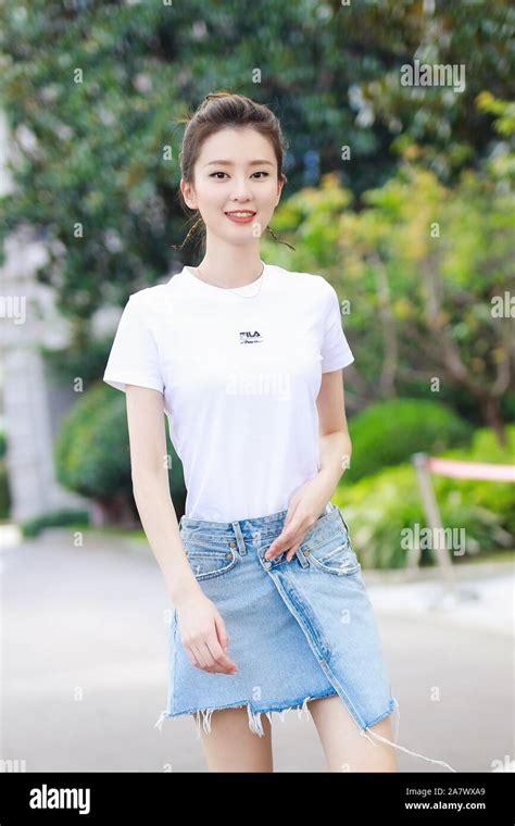 Chinese actress Qiao Xin, also known as Bridgette Qiao, poses before ...