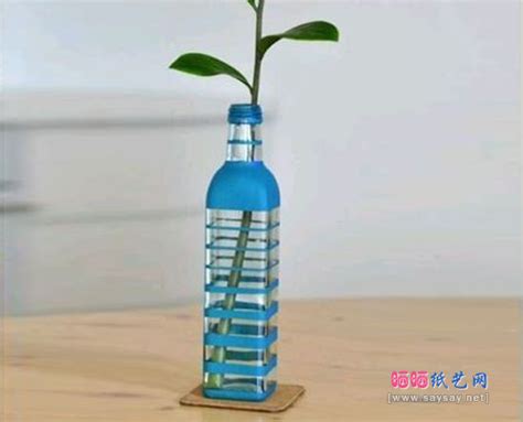 废弃玻璃瓶绕线DIY制作漂亮花瓶的方法步骤_玻璃瓶手工_巧艺网
