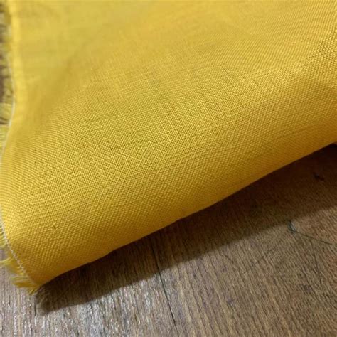 日本进口短幅细纱纯亚麻芒果黄纯色时装布料柔软亲肤服装设计面料-淘宝网