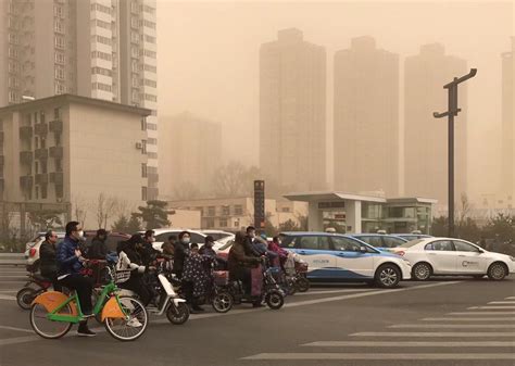 沙尘暴过后蓝天回归 一组图看北京沙尘前后天空对比-图片频道