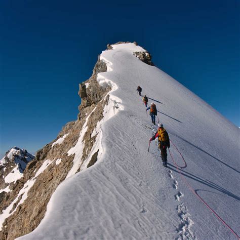 高山攀登的女攀岩者图片-高山攀登素材-高清图片-摄影照片-寻图免费打包下载
