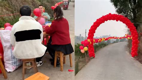 新郎村里结婚30位亲友相助，架设2公里气球路迎新娘，满满的重视_新浪新闻