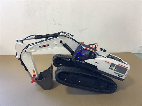 儿童电动遥控挖掘机合金版可充电六通无线遥控履带工程车模型玩具-阿里巴巴
