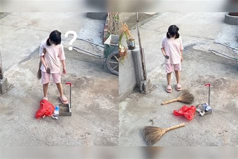 治疗人们女学生帮助在狗走路时用扫帚清混凝土地板水泥高清图片下载-正版图片308005564-摄图网