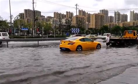 暴雨把汽车淹了，如何正确处理？_搜狐汽车_搜狐网