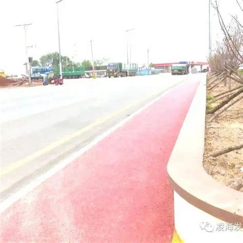 国道102线凌海城区段两侧路面硬化及排水改造工程完工_道路