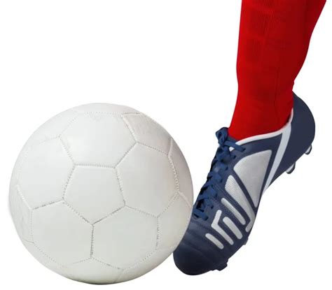 Jugador de fútbol pateando pelota: fotografía de stock © Wavebreakmedia ...