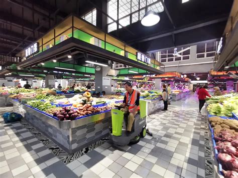 海口龙华区13个农贸市场增加公益摊位 保平价菜供应-新闻中心-南海网