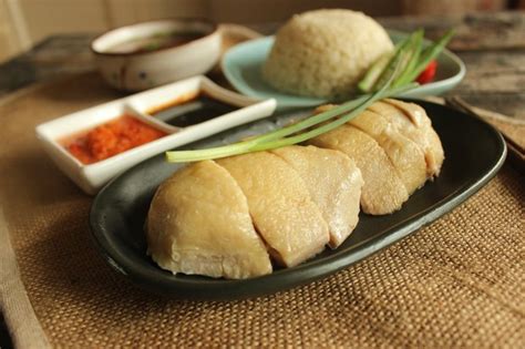 2024这里号称是槟城最好吃的海南鸡饭，海南鸡饭（Hainanese Chicken Rice）起源于..._伍秀泽海南鸡饭-评论-去哪儿攻略
