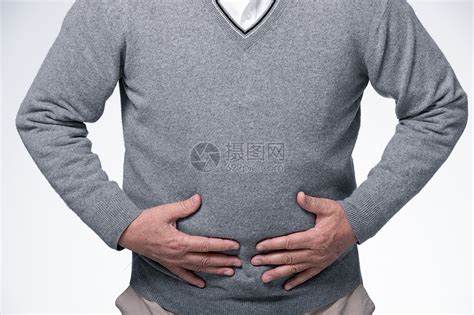 捂着肚子腹部疼痛的男性高清图片下载-正版图片501701777-摄图网
