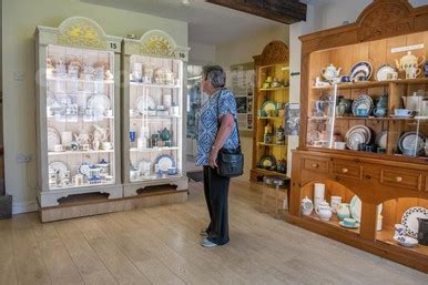 39718478-A visitor looks at the collection of Hornsea Pottery on ...